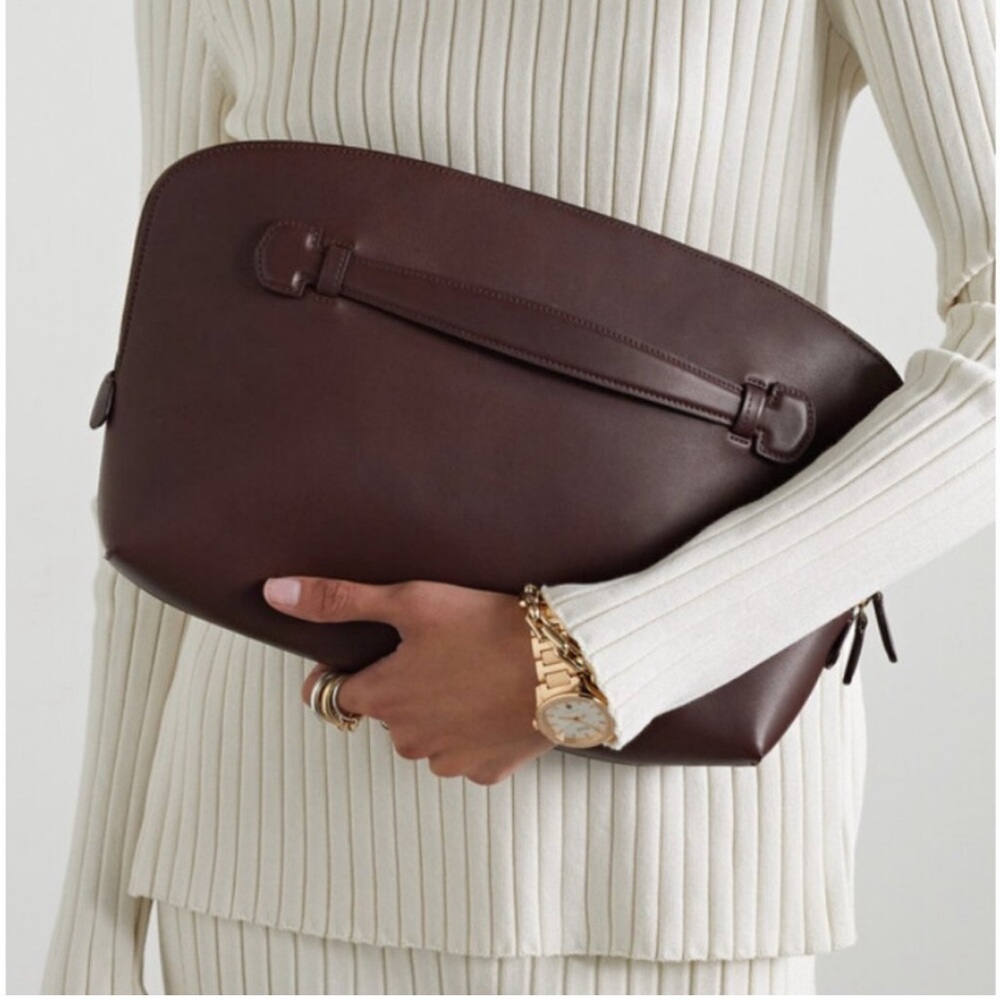 The Row Ellie clutch in burgundy
